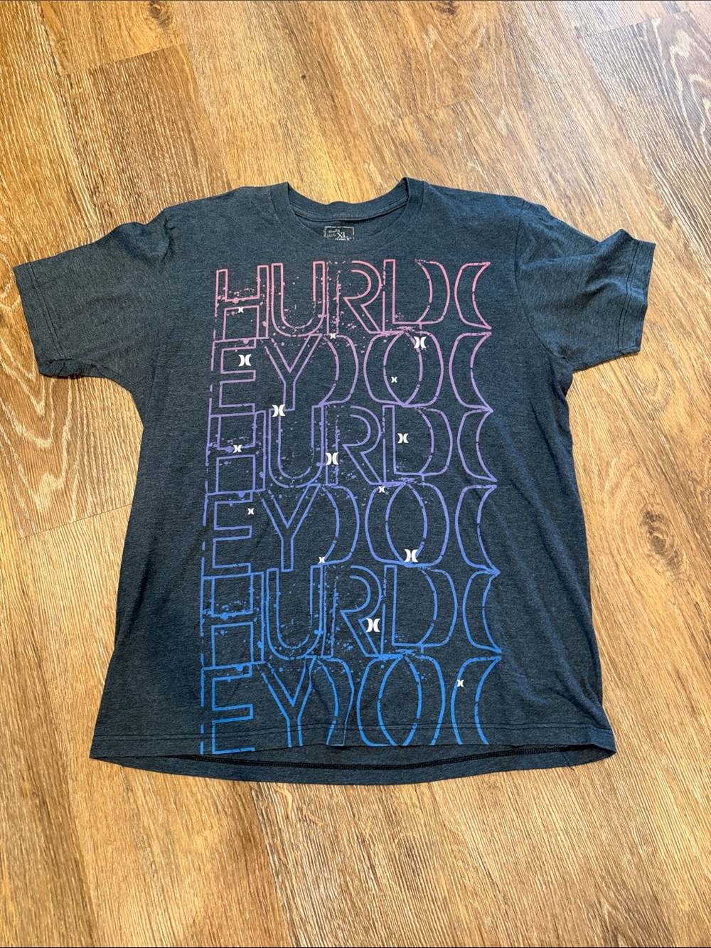 Hurley Men’s Black Tee with Pink-to-Blue Gradient Logo